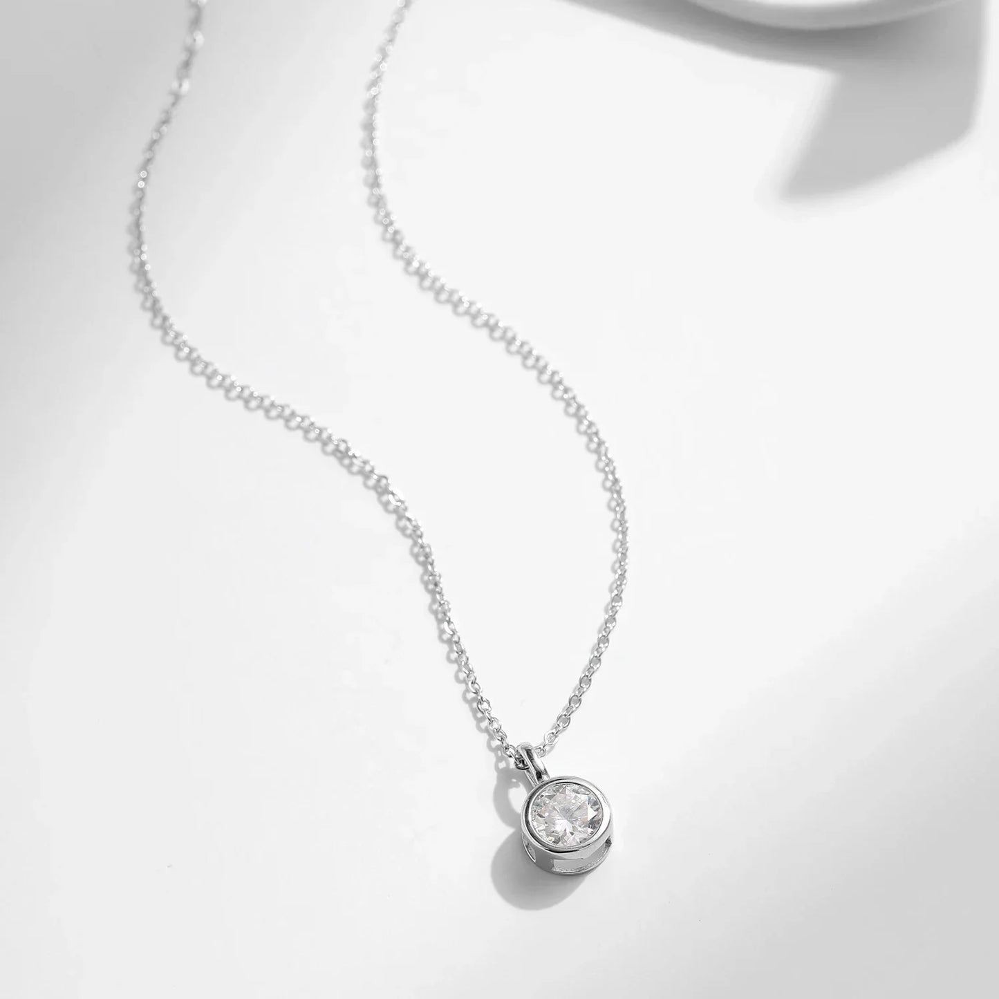 NAVIAN® 1 Carat Round Bezel Moissanite Pendant Necklace