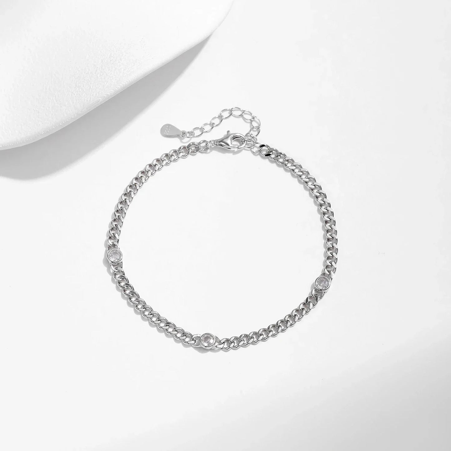 NAVIAN® White Gold Plated Round Moissanite Twisted Bracelet - Sterling Silver