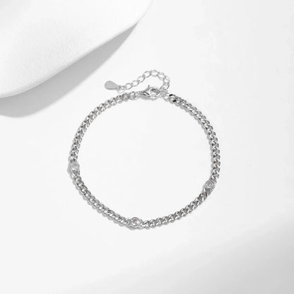 NAVIAN® White Gold Plated Round Moissanite Twisted Bracelet - Sterling Silver