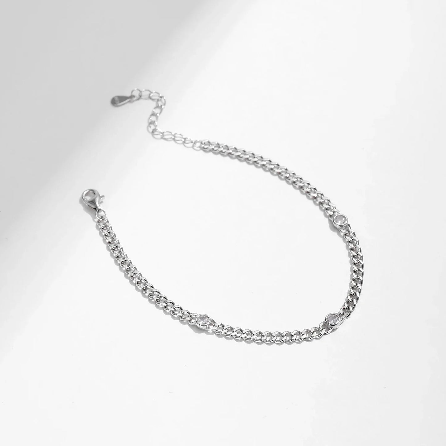 NAVIAN® White Gold Plated Round Moissanite Twisted Bracelet - Sterling Silver